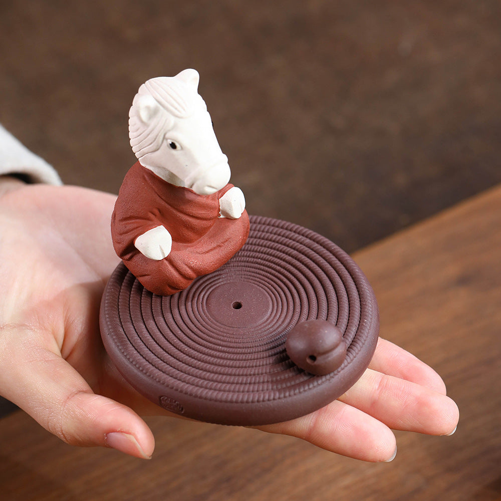 Mascottes de thé chevale zen en argile