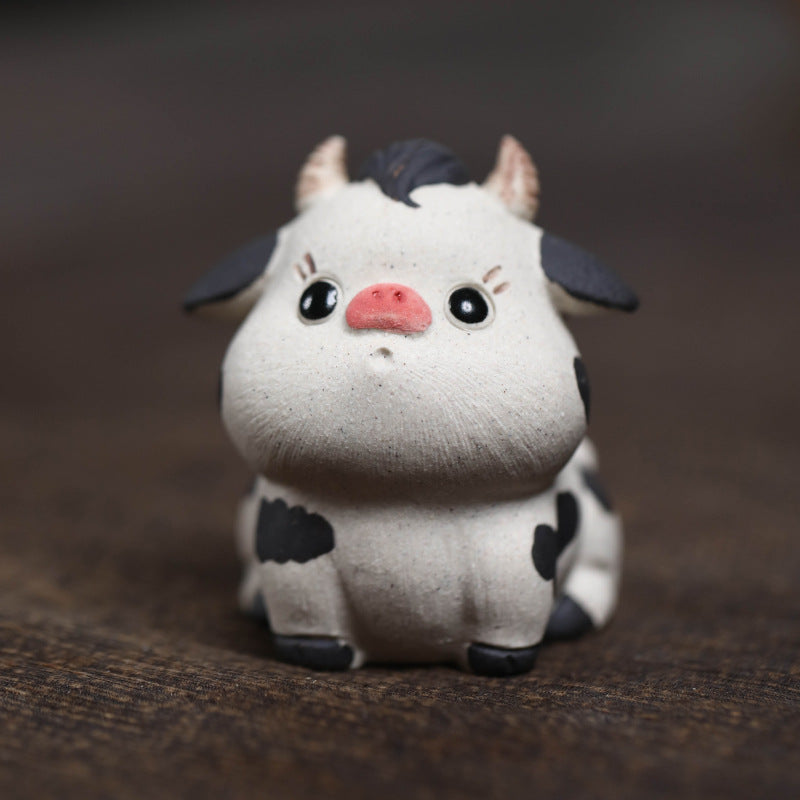 Mascottes de thé vache cute en argile