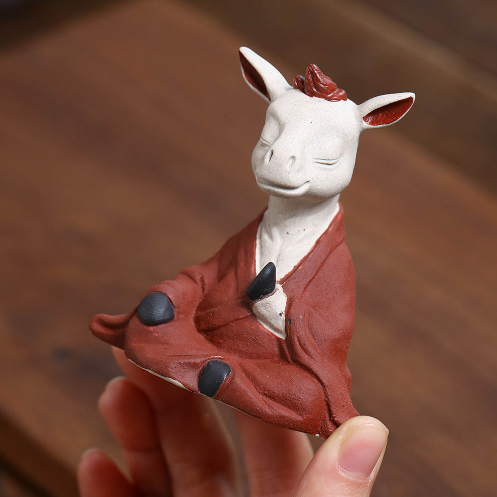 Mascottes de thé vache zen en argile