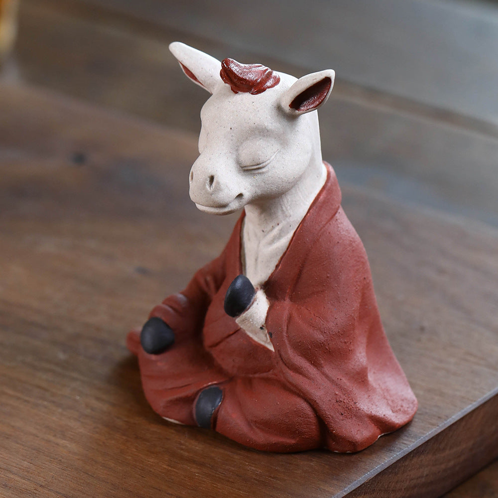 Mascottes de thé vache zen en argile