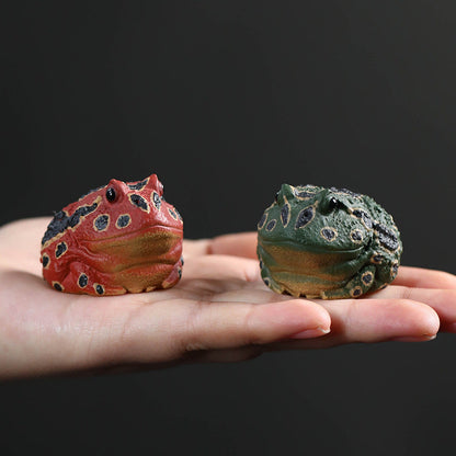 Mascottes de thé poison grenouille en argile