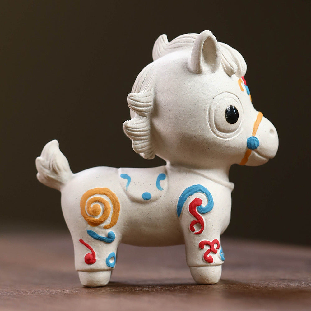 Mascottes de thé chevale blanc en argile