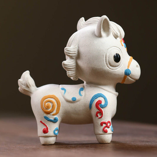 Mascottes de thé chevale blanc en argile
