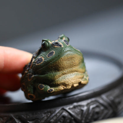 Mascottes de thé poison grenouille en argile