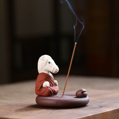 Mascottes de thé chevale zen en argile