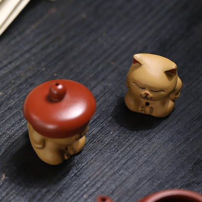 Mascottes de thé chat dormant en argile