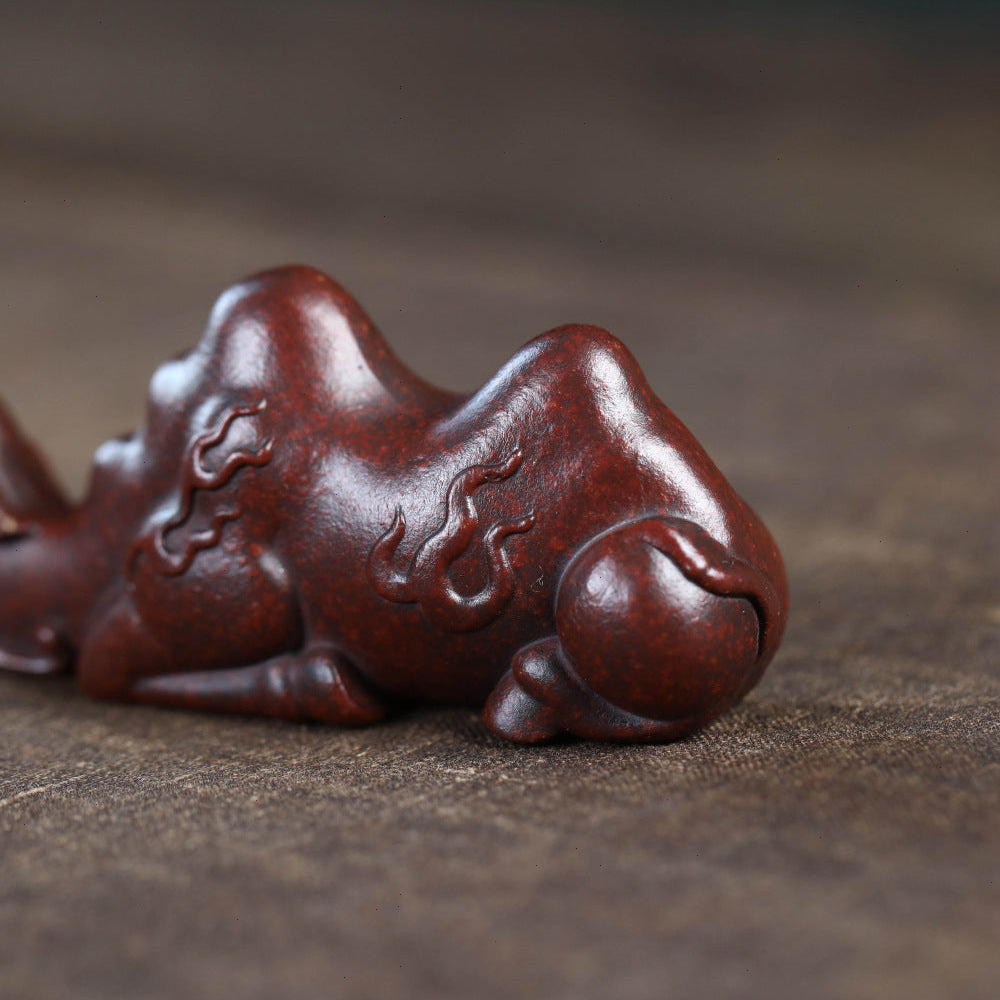 Mascottes de thé posson rouge en argile