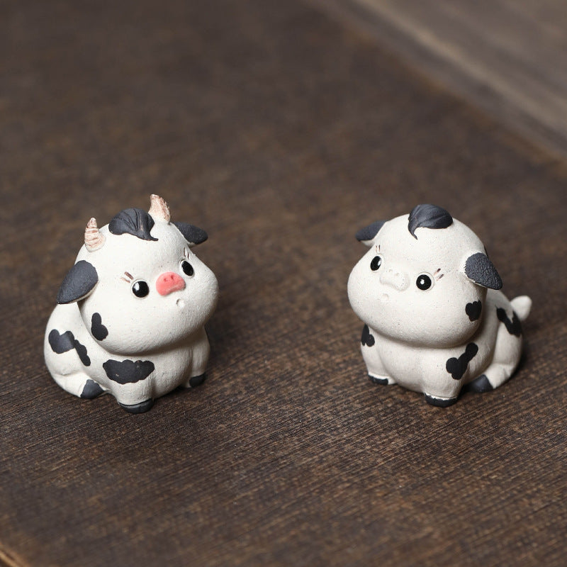 Mascottes de thé vache cute en argile