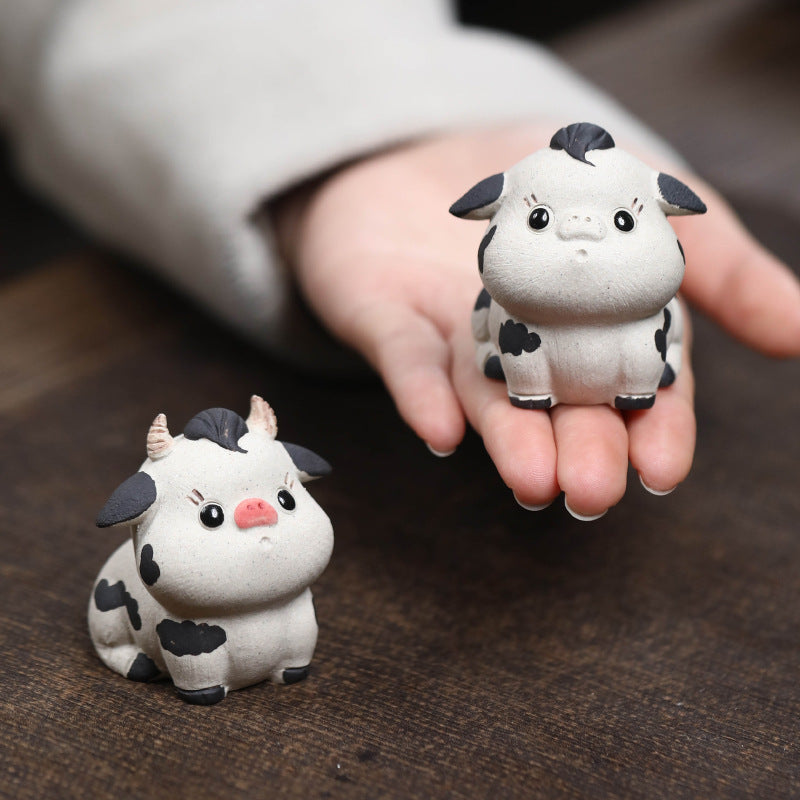 Mascottes de thé vache cute en argile