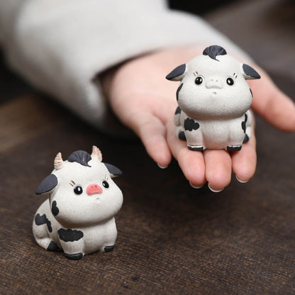 Mascottes de thé vache cute en argile