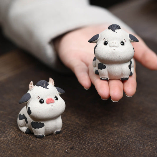 Mascottes de thé vache cute en argile