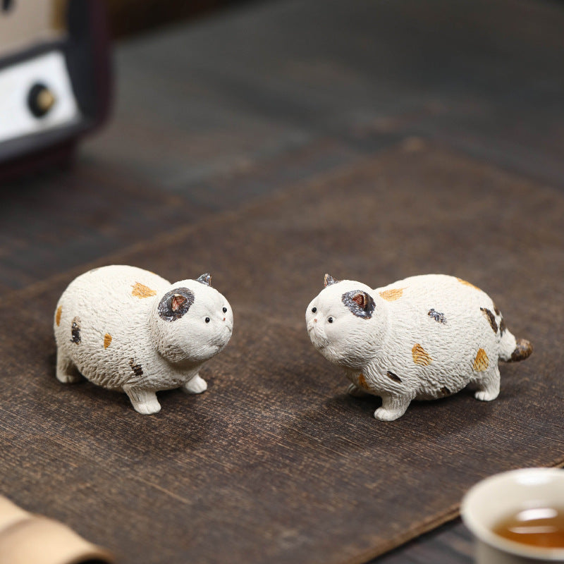Mascottes de thé white chat en argile