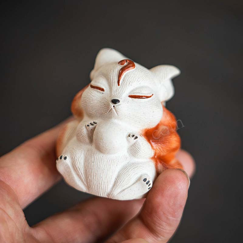 Mascottes de thé renard blanc zen