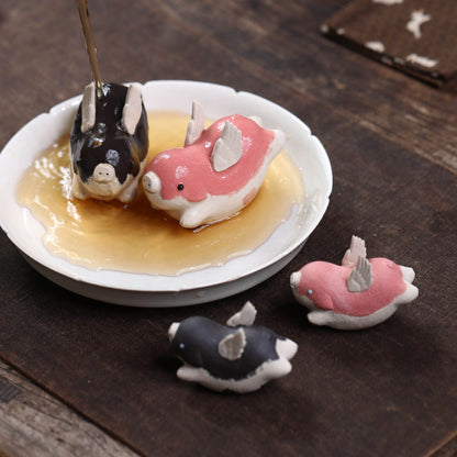 Mascottes de thé dophine en argile