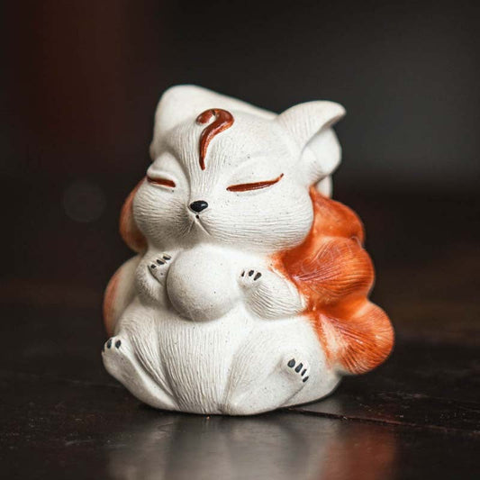 Mascottes de thé renard blanc zen