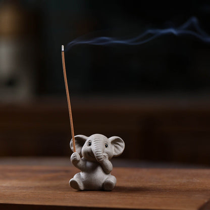 Mascottes de thé elephant gris mignon argile