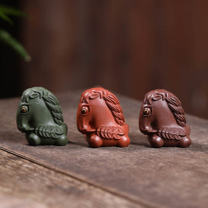 Mascottes de thé chevalier en argile