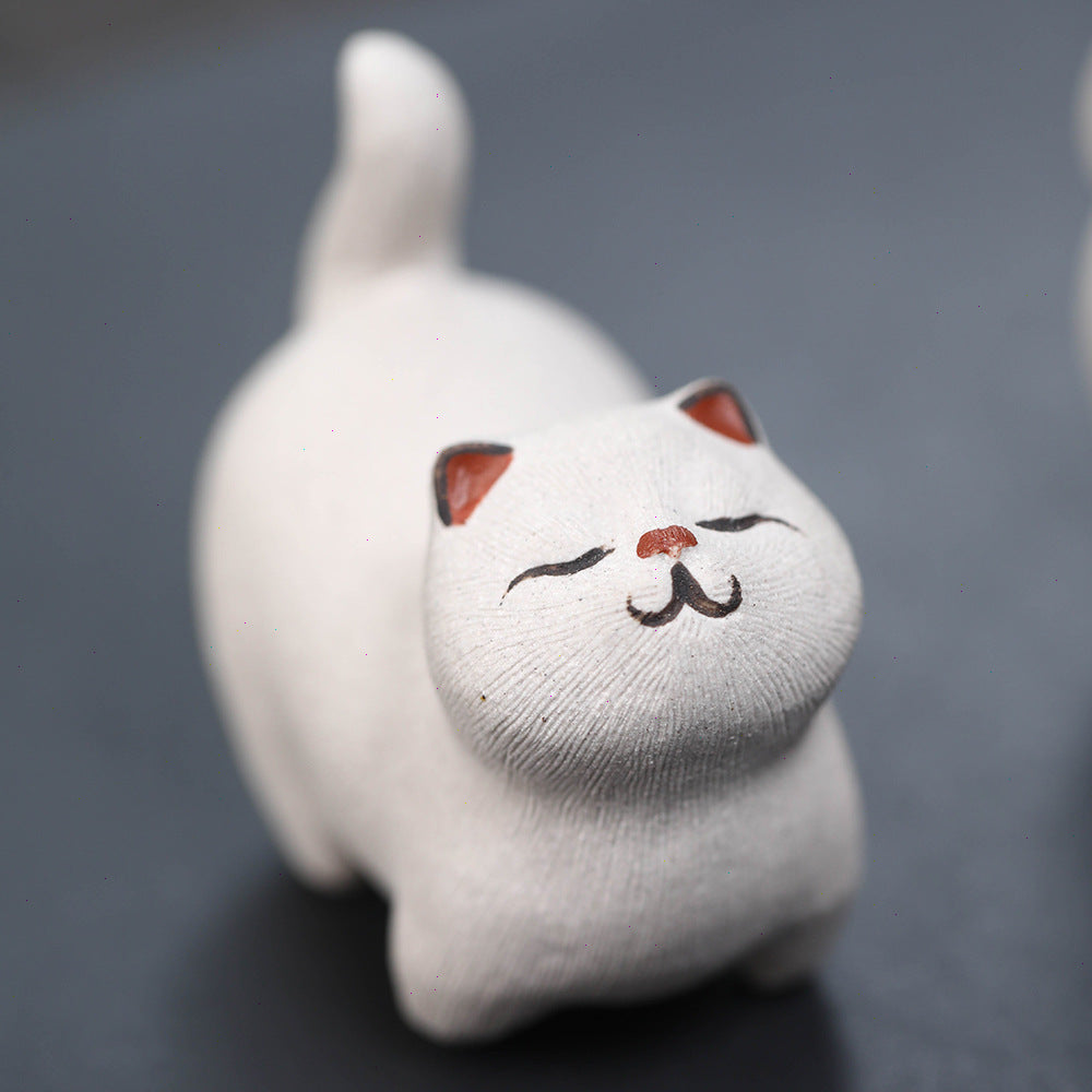 Mascottes de thé chat dormant blanc