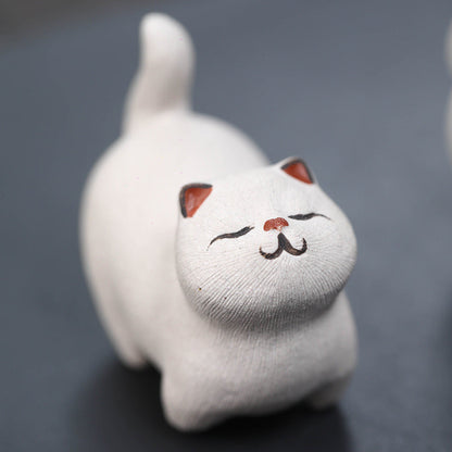 Mascottes de thé chat dormant blanc