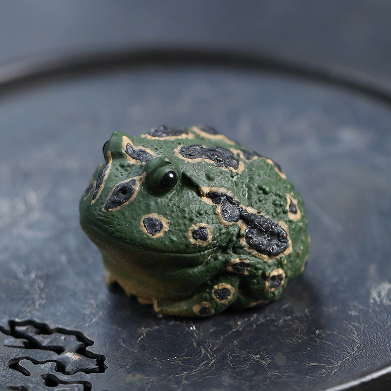 Mascottes de thé poison grenouille en argile