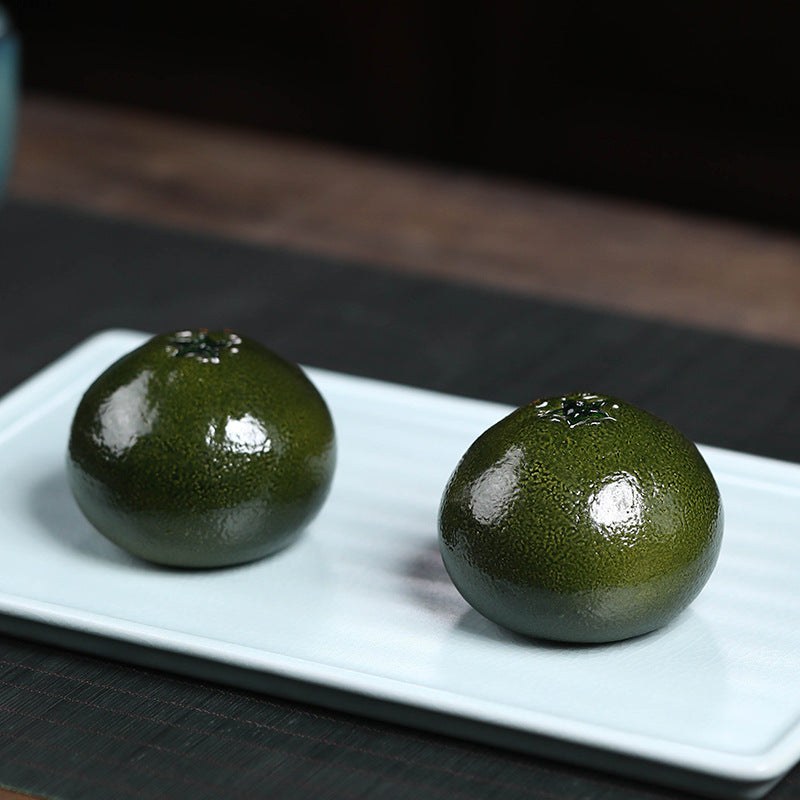Mascottes de thé citrons en argile