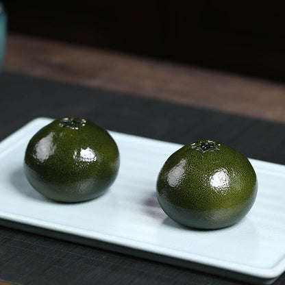 Mascottes de thé citrons en argile