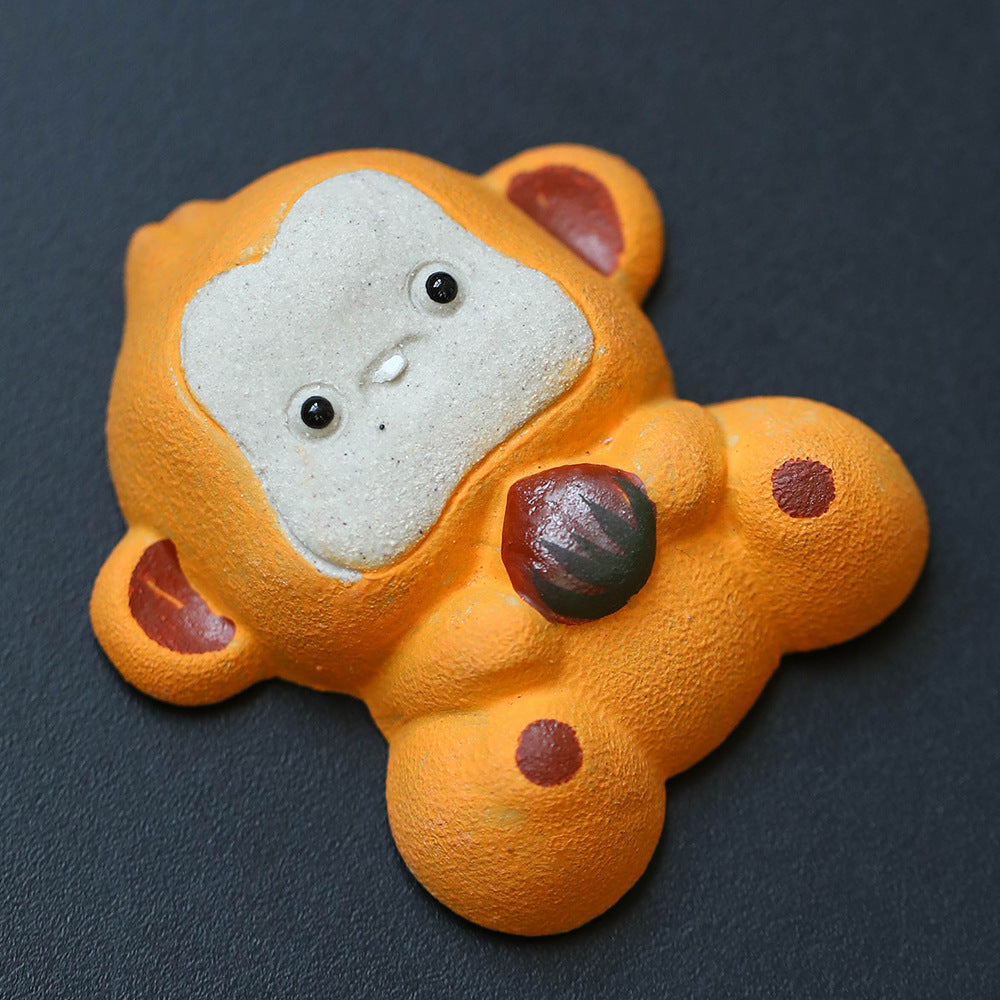 Mascottes de thé cheval orange en argile