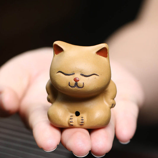 Mascottes de thé chat dormant en argile