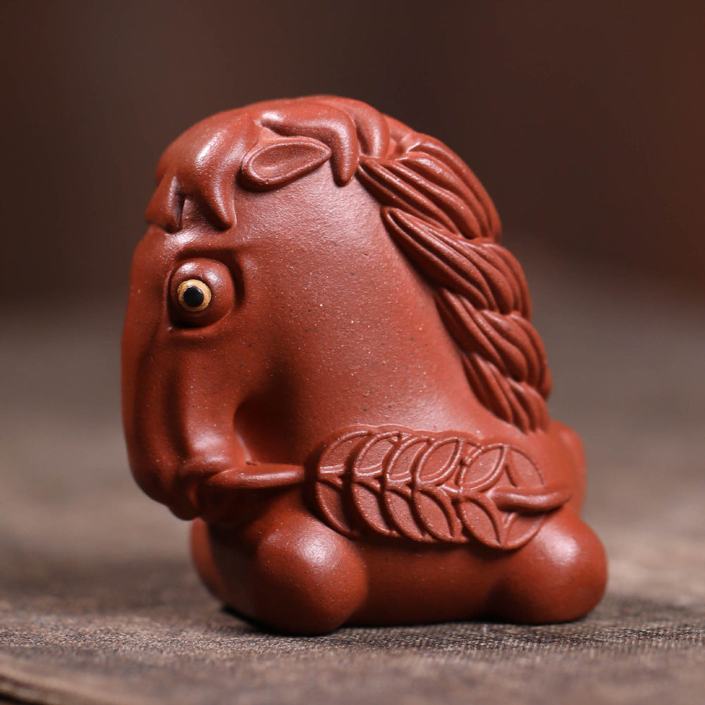 Mascottes de thé chevalier en argile