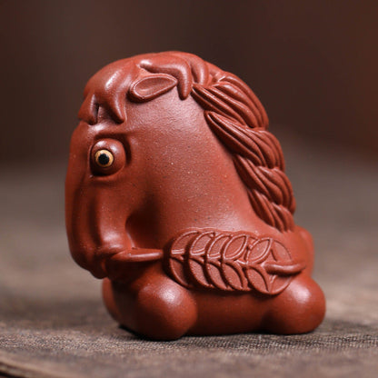 Mascottes de thé chevalier en argile