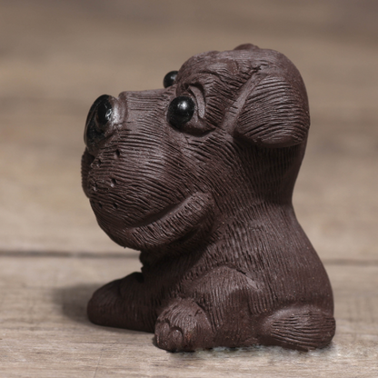 Mascottes de thé chien cartoon en argile