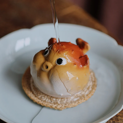 Mascotte de Thé Grue en Céramique