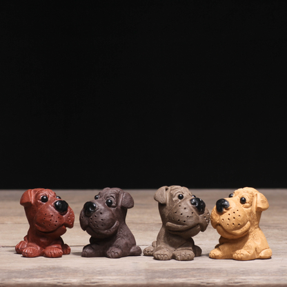 Mascottes de thé chien cartoon en argile