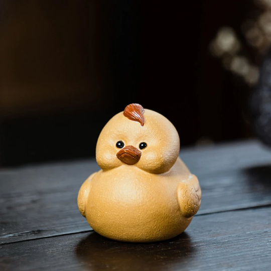 Mascotte de Thé Phénix Doré en Argile