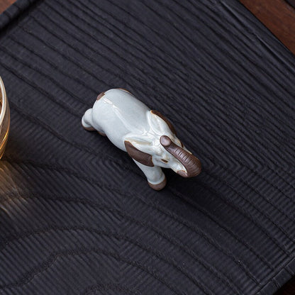 Mascottes de thé éléphant blanc marron