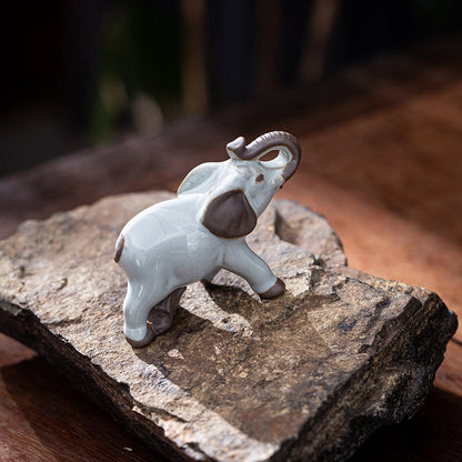 Mascottes de thé éléphant blanc marron