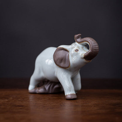 Mascottes de thé éléphant blanc marron