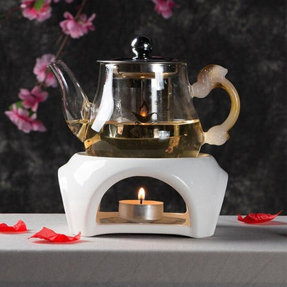 CHAUFFE THÉIÈREEN PORCELAINE BLANCHE