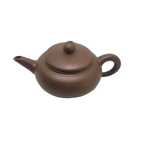 mini theiere en ceramique marron sur fond blanc