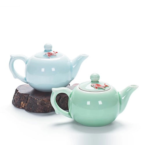 deux Petite théière en porcelaine