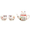 service à thé en porcelaine chat sur fond blanc