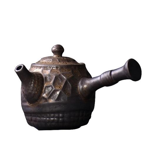 théière en céramique artisanale manche