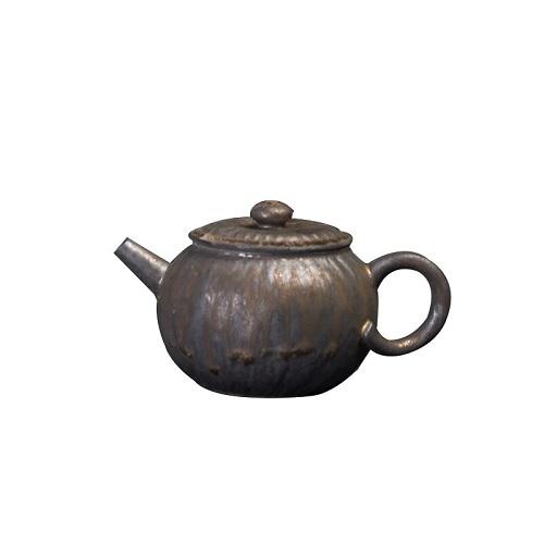 théière céramique vintage noire fond uni