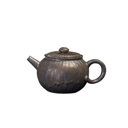 théière céramique vintage noire fond uni