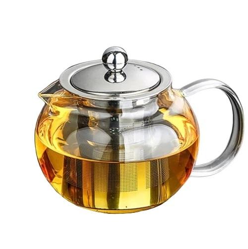théière en verre ronde sur fond blanc