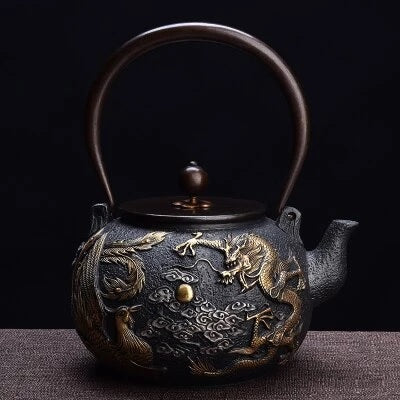 théière en fonte oeil du dragon dorée