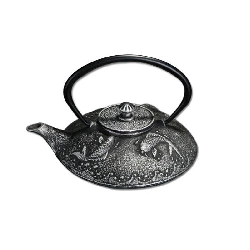 théière en fonte blanche