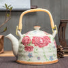Theiere ceramique chinoise avec motif fleur rose